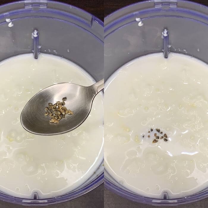 Adding Cardamom seeds to a mango lassi blending jug