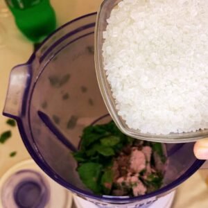 Adding sugar in a blending jug