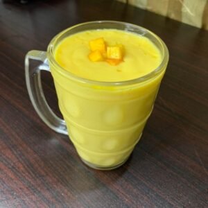 Mango Lassi Topped With Mango Chunks